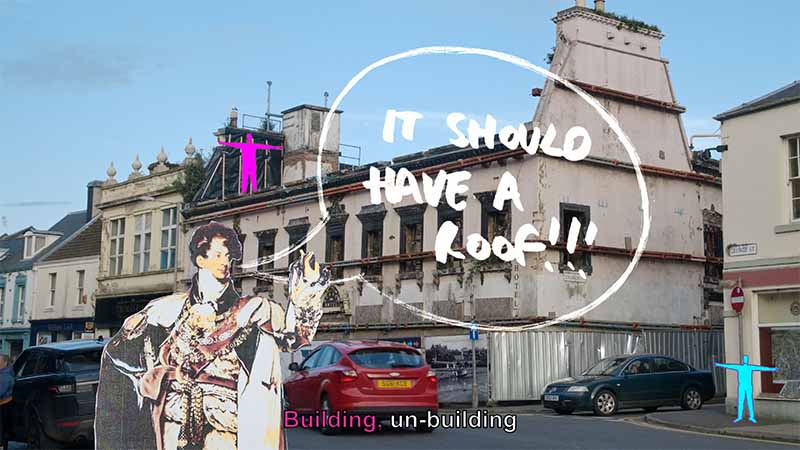 Cut-out regal figure gestures at the ruined George Hotel with scrawled text 'It should have a roof!', film still